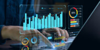 Businessman works on laptop Showing business analytics dashboard with charts, metrics, and KPI to analyze performance and create insight reports for operations management. Data analysis concept.Ai